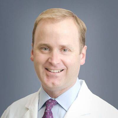 M. Dews, MD