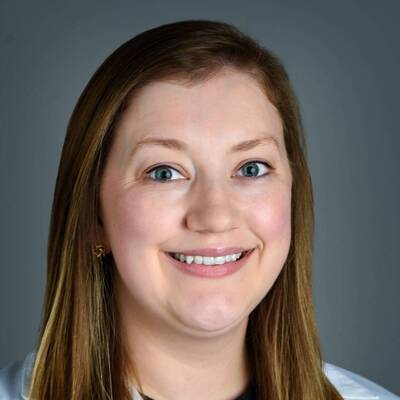 A headshot of Kaitlin Poston Walsh, NP